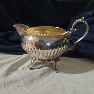 Elegant Silver Creamer with Gold Interior by Wm Rogers